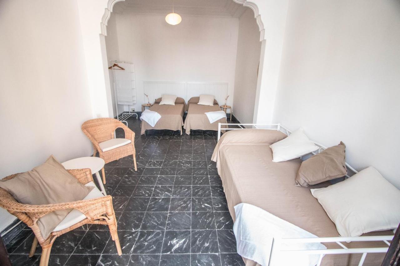 Triple Room with Balcony and Shared Bathroom
