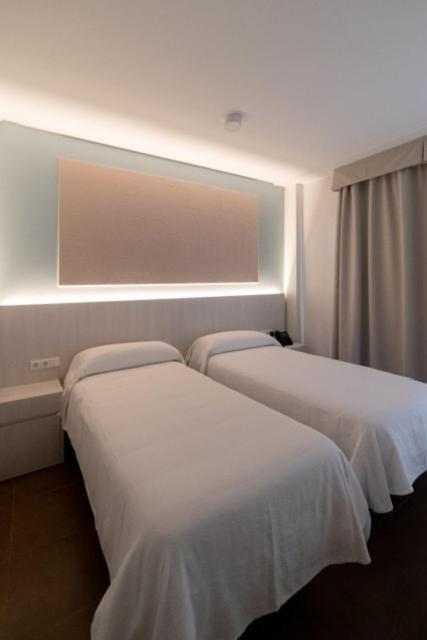 Quarto com 2 Camas de Solteiro