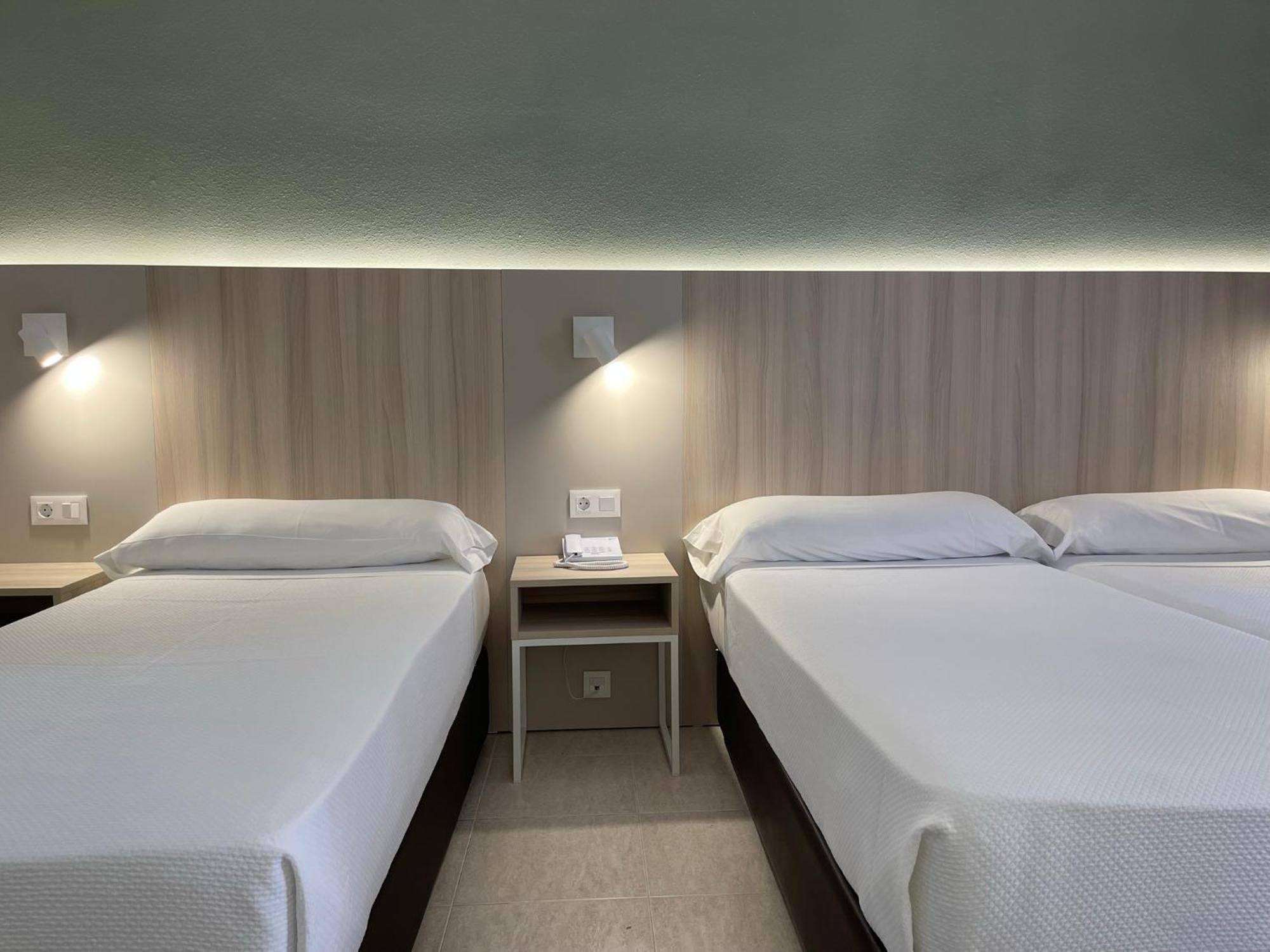 Quarto Duplo com Cama Extra (3 Adultos)