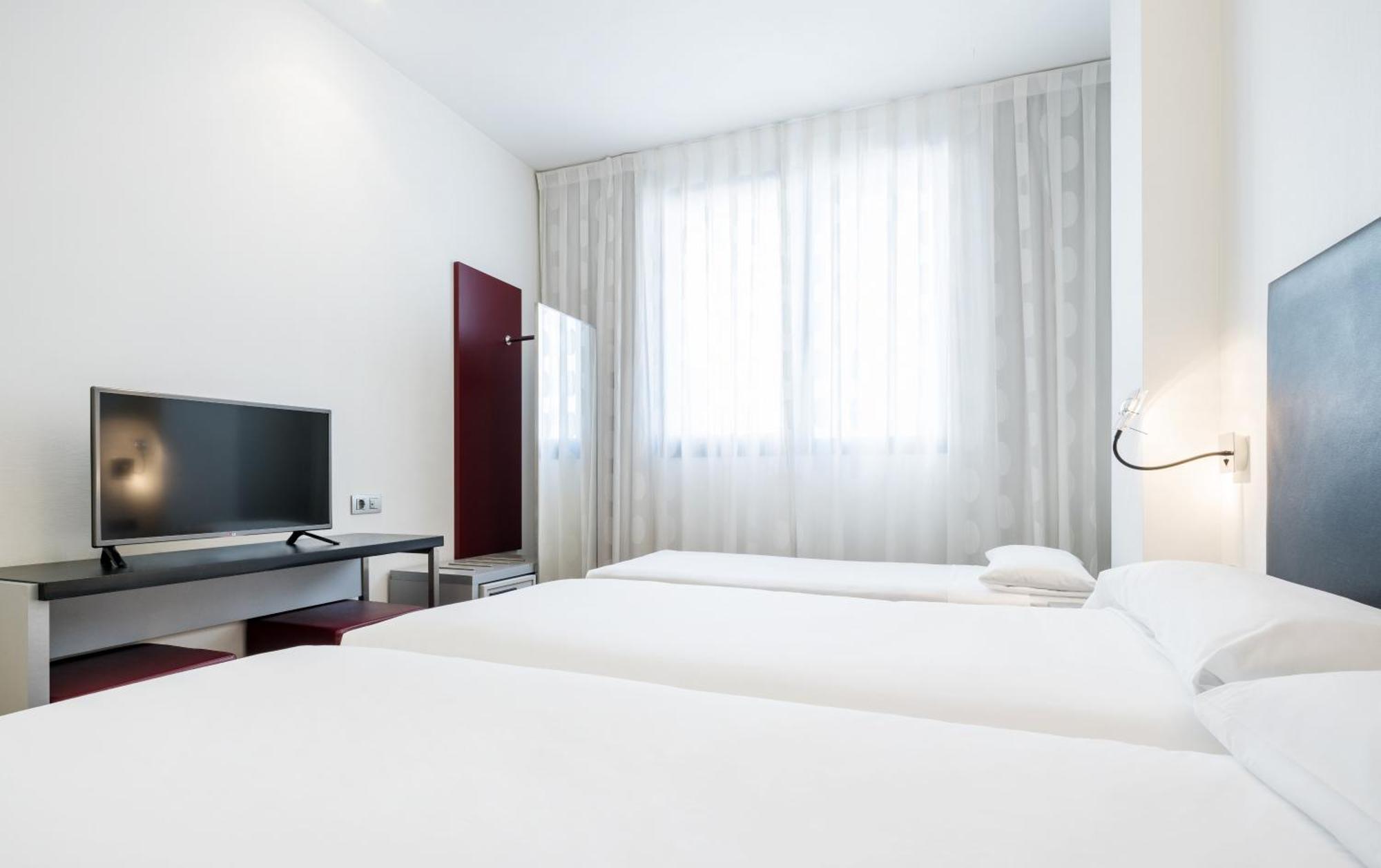 Quarto Triplo (2 Adultos + 1 Criança)