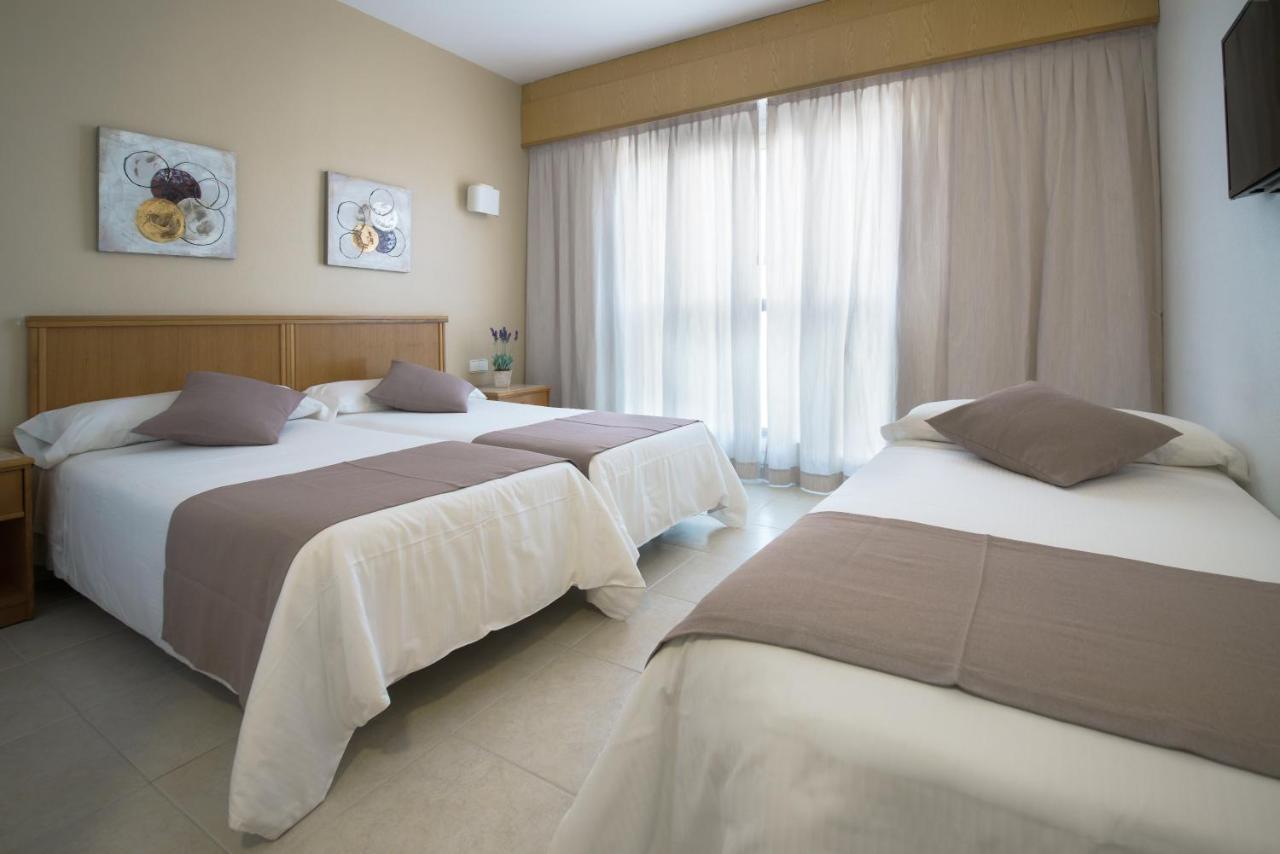 Chambre Triple avec Terrasse